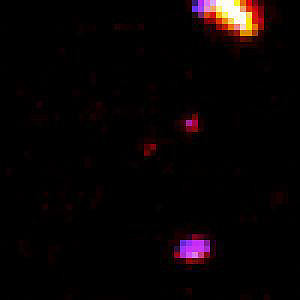 Long exposure image using the NICMOS instrument on HST, resulting in imaging of  several galaxies whose redshift values suggest they may be from 12 to 13 billion light years away (hence are being seen now when still young).